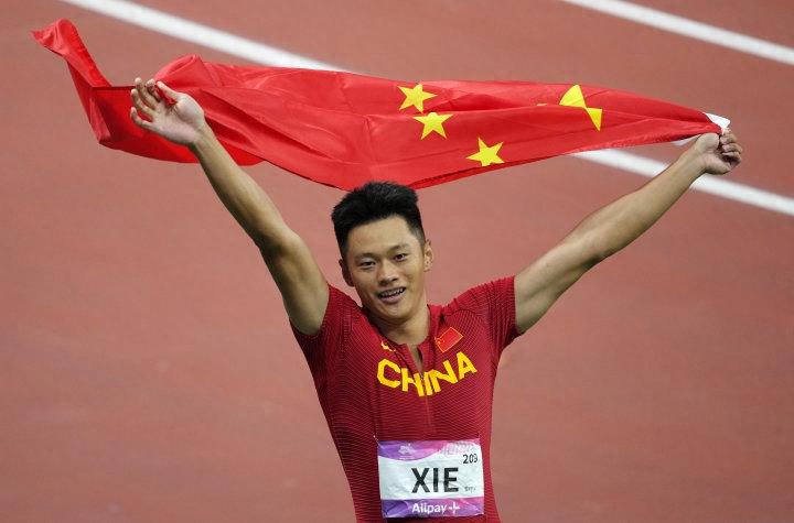 中国田径运动员谢震业：年轻的心，永远为梦想冲刺